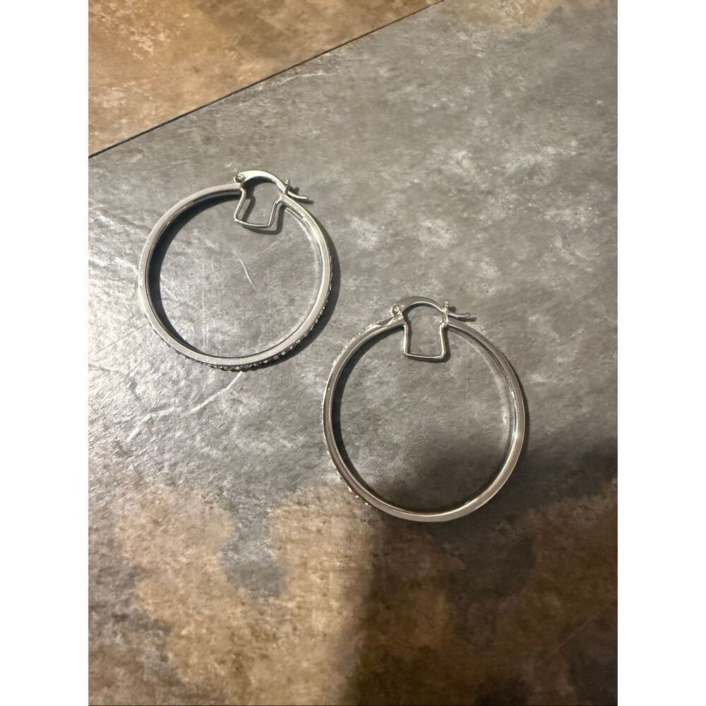 Sparkly silver hoop earrings